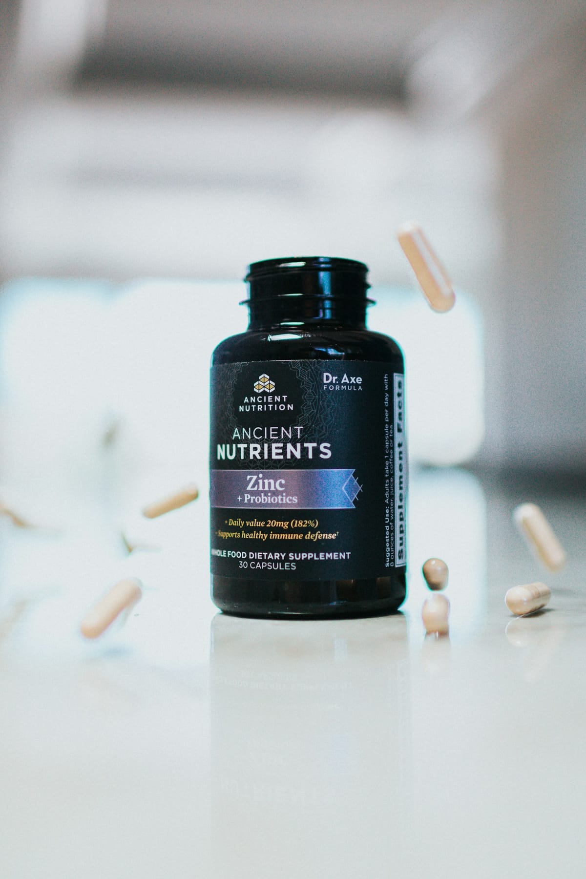 Vitamin and supplement bottle on a clean surface
