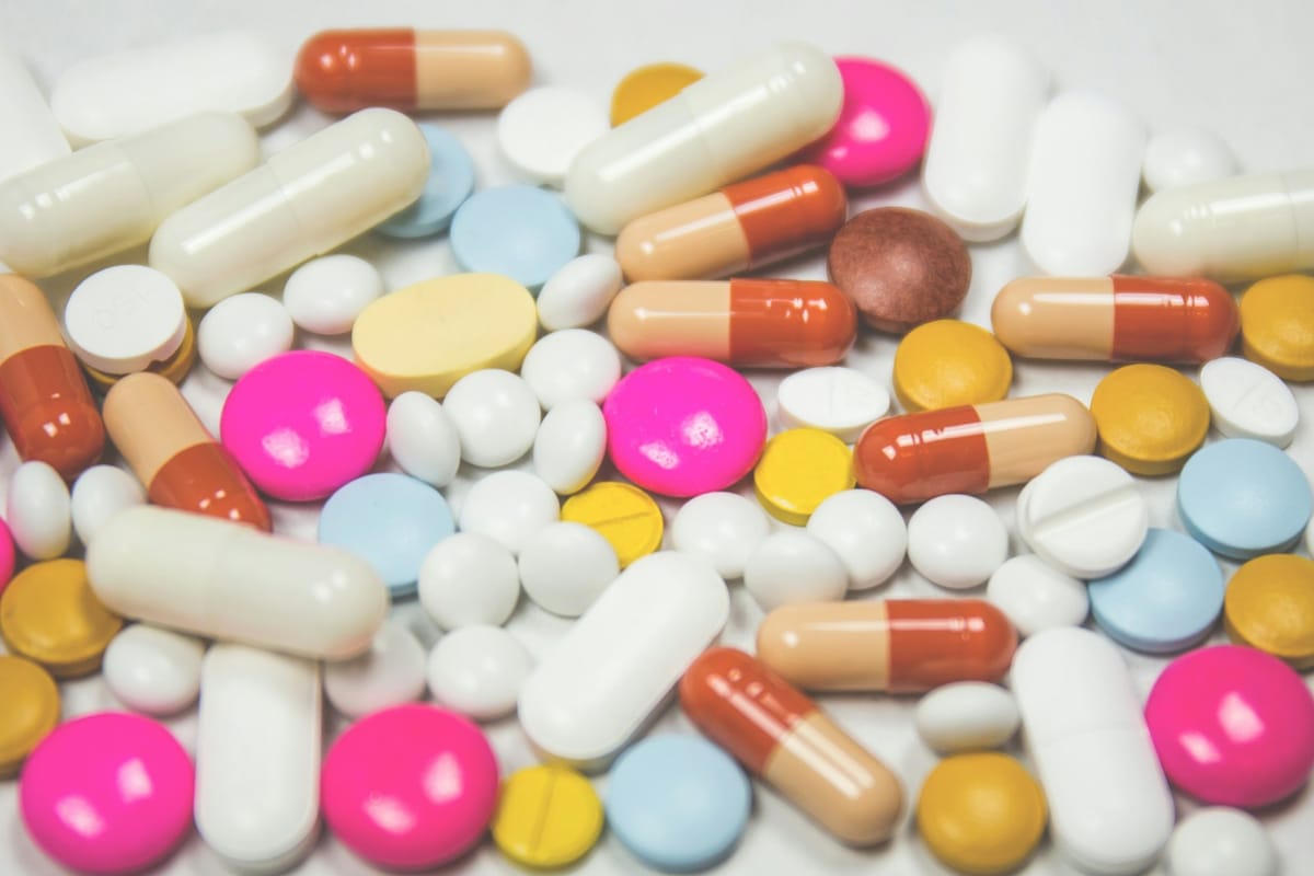 Supplement and medicine bottles representing regulatory classification of botanical products