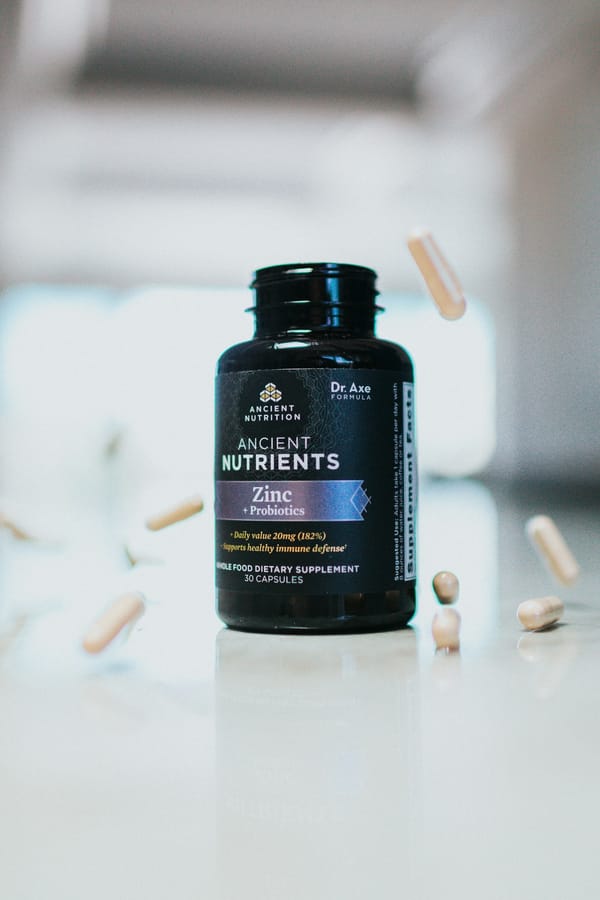Vitamin and supplement bottle on a clean surface